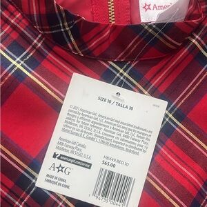 Girls holiday dress 
Red Plaid taffeta with tulle petticoat